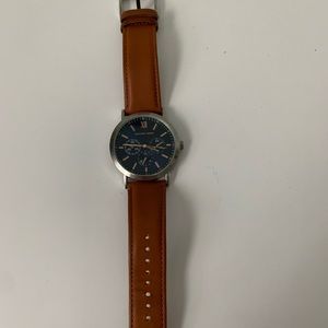 Geoffrey Beene Watch with leather band.